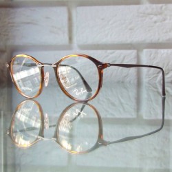 Bardzo lekkie okragle szylkretowe oprawki Ray-Ban Lightray z tytanowymi zausznikami RX7073 5588